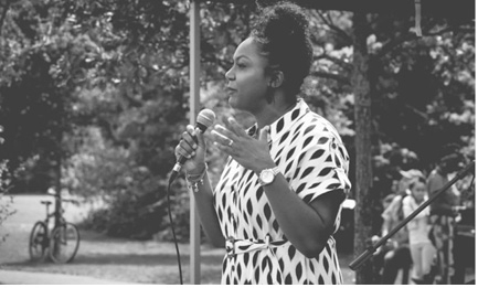 Alexandra Dauley speaking at a Black Lives Matter event on Tooting Bec Common in July 2020