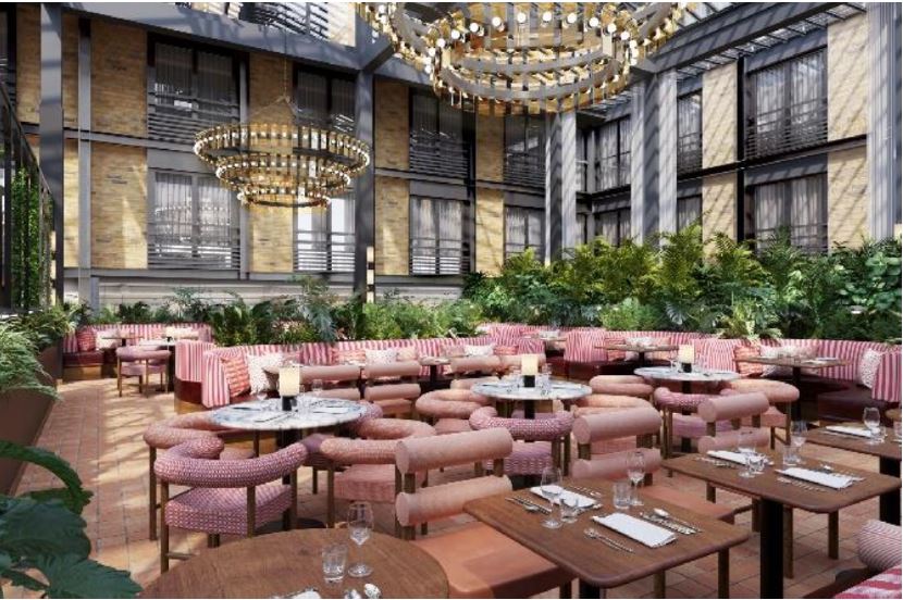 The natural terracotta floor is punctuated with contemporary and colourful soft furnishings