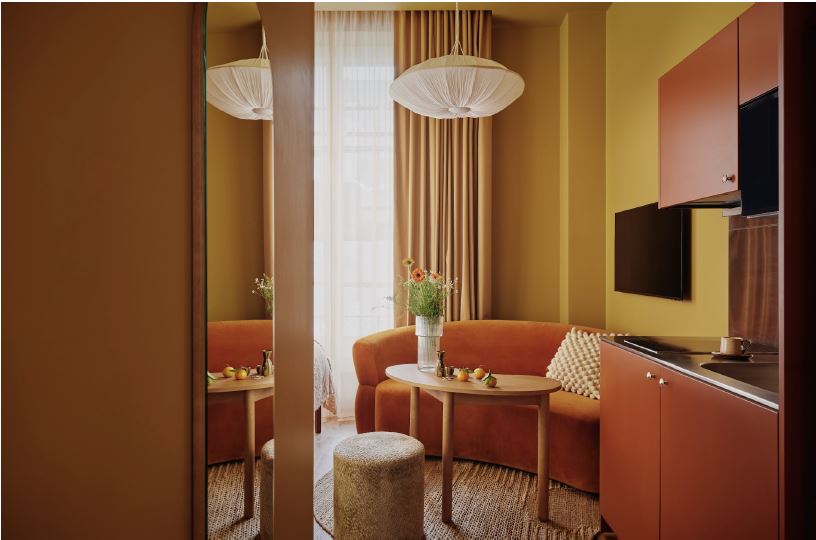 Above and below: The Garden Suite has a chic residential, Parisian apartment aesthetic.